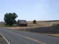 Sun 16 - Disking saves Rinker barn and house.